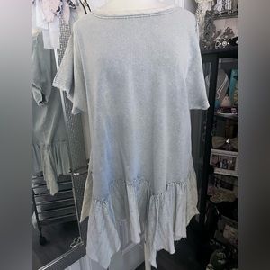 Cute light denim blue tunic with asymmetrical ruffled bottom